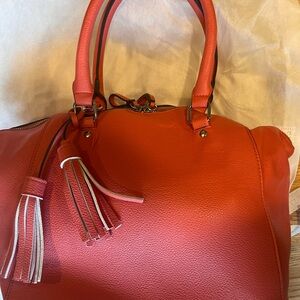 Just fab satchel. Coral. Beautiful and never used.